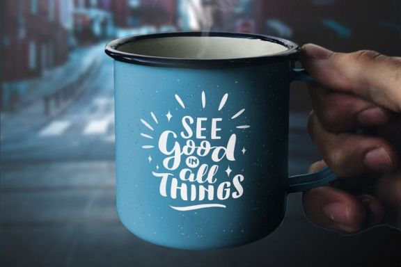 Hand holding Enamel Mug – Mockup