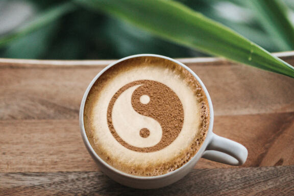 Chocolate powder logo mockup in coffee cup