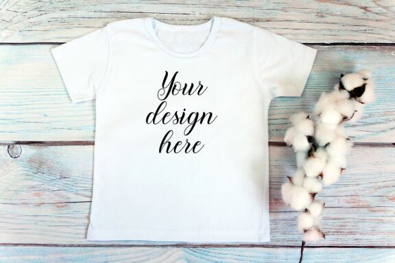 Kids White t-shirt Mockup bundle on a wooden background.