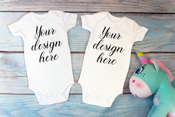 Kids Mockup Bundle of two baby bodysuits with toys. Twin baby bodysuit mockup. Kids Mockup Bundle.
