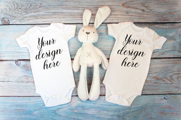Kids Mockup Bundle of two baby bodysuits with toys. Twin baby bodysuit mockup. Kids Mockup Bundle.