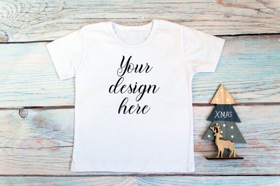 Christmas t-shirts and bodysuits mockups Bundle on a wooden background. Winter Christmas styled photo mockup.