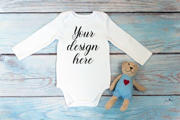 Bodysuit Mockup Bundle with long sleeves on a wooden background.