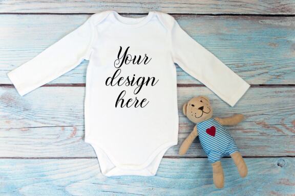 Bodysuit Mockup Bundle with long sleeves on a wooden background.