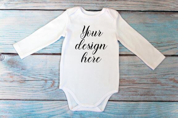 Bodysuit Mockup Bundle with long sleeves on a wooden background.