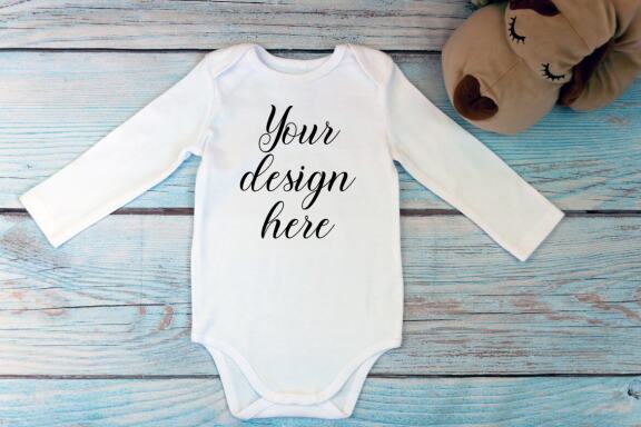 Bodysuit Mockup Bundle with long sleeves on a wooden background.
