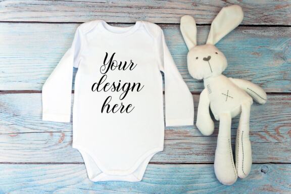 Bodysuit Mockup Bundle with long sleeves on a wooden background.