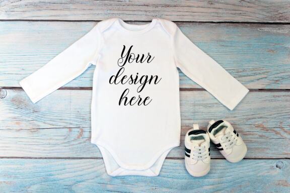 Bodysuit Mockup Bundle with long sleeves on a wooden background.