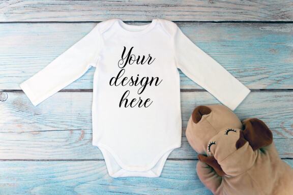 Bodysuit Mockup Bundle with long sleeves on a wooden background.