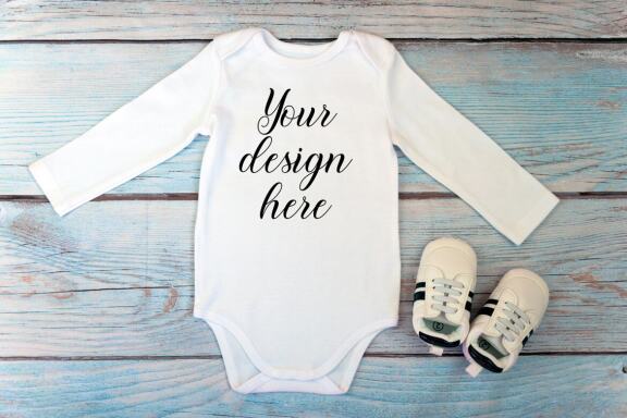 Bodysuit Mockup Bundle with long sleeves on a wooden background.