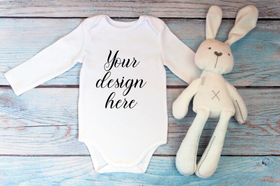 Bodysuit Mockup Bundle with long sleeves on a wooden background.