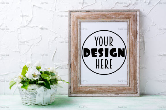 Wooden picture frame mockup with apple tree flowers.