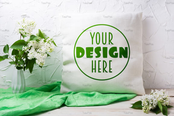 Pillow mockup with white lilac in the vase.