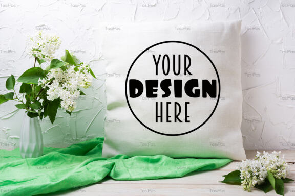 Pillow mockup with white lilac in the vase.