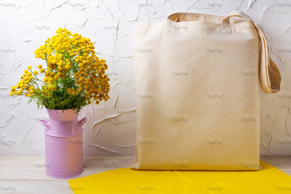 Tote bag mockup with yellow flowers