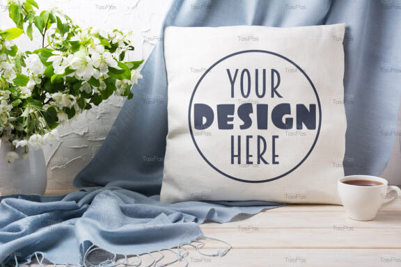 Pillow mockup with apple blossom branches and blue scarf.