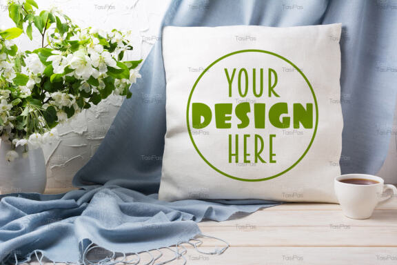 Pillow mockup with apple blossom branches and blue scarf.
