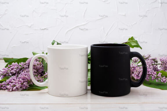 White and black mug mockup with lilac bouquet.