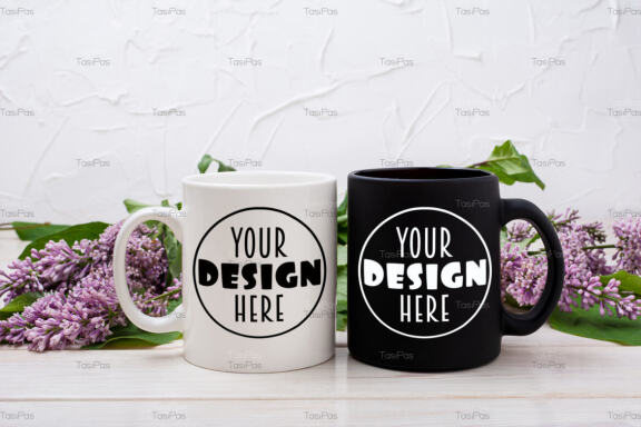 White and black mug mockup with lilac bouquet.