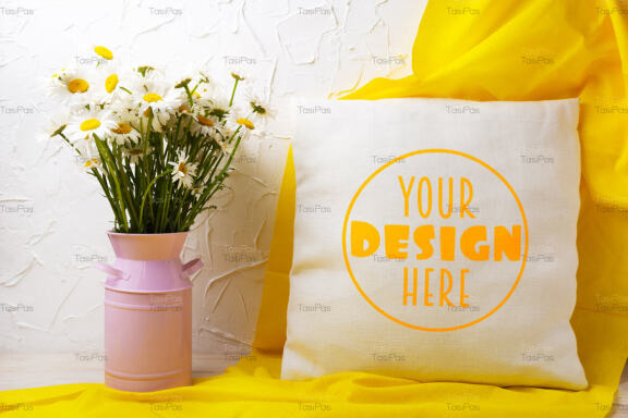 Pillow mockup with daisy flowers and yellow scarf.