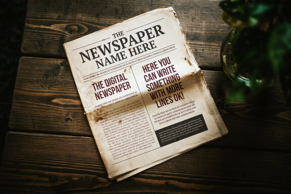 Newspaper Mockups with Editable Content and Cover