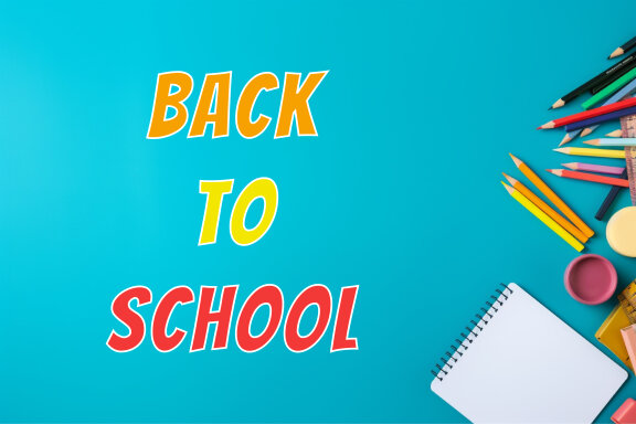 School supplies with cyan background