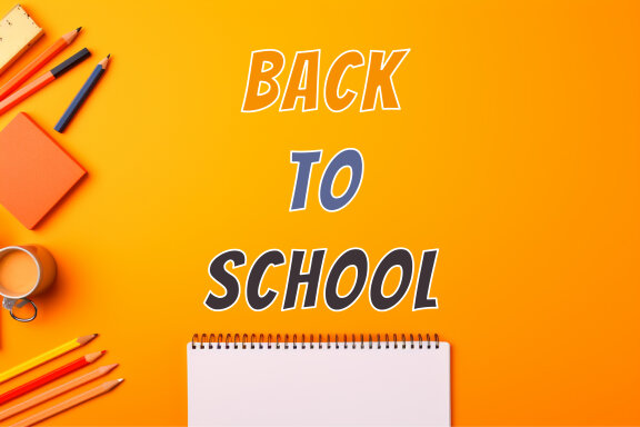 School supplies with orange background