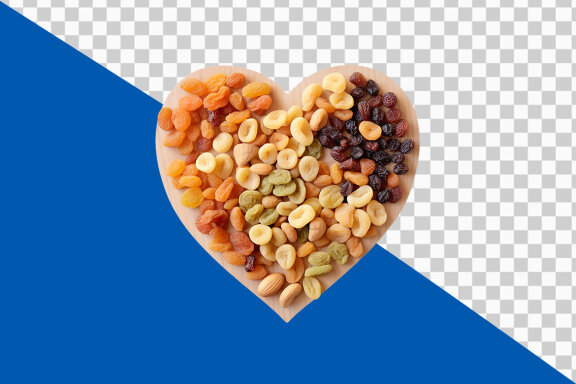 Fresh dried fruits and nuts in heart shape on transparent background PNG image